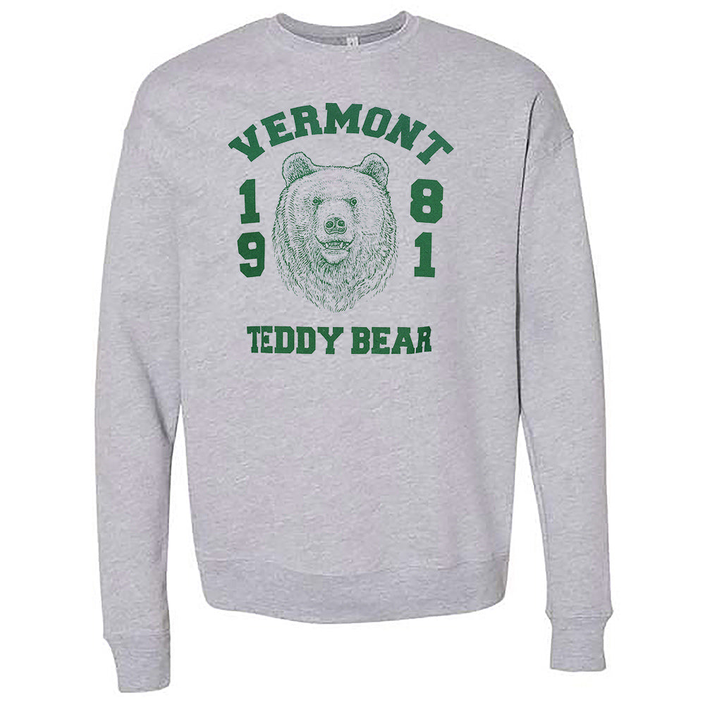 Gray sweatshirt with green "Vermont 1981 Teddy Bear" text and bear graphic on front.