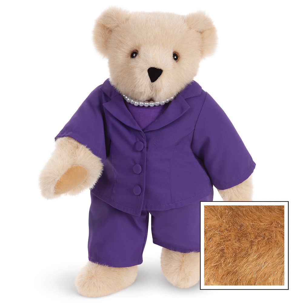 15-inch honey-colored teddy bear wearing a tailored purple business suit with jacket and pants, black button accents, and a.